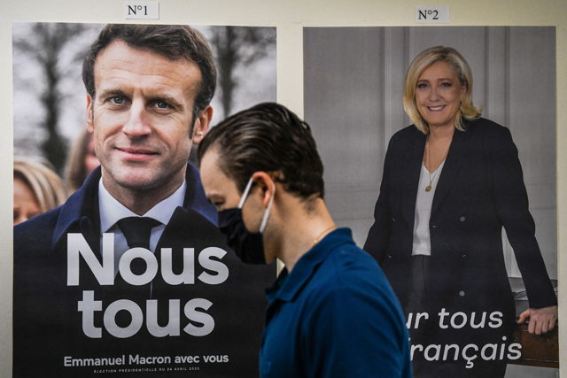 A voter arrives to vote during the second round of the French elections at the French Consulate in Miami, Florida, on Saturday (AFP photo)