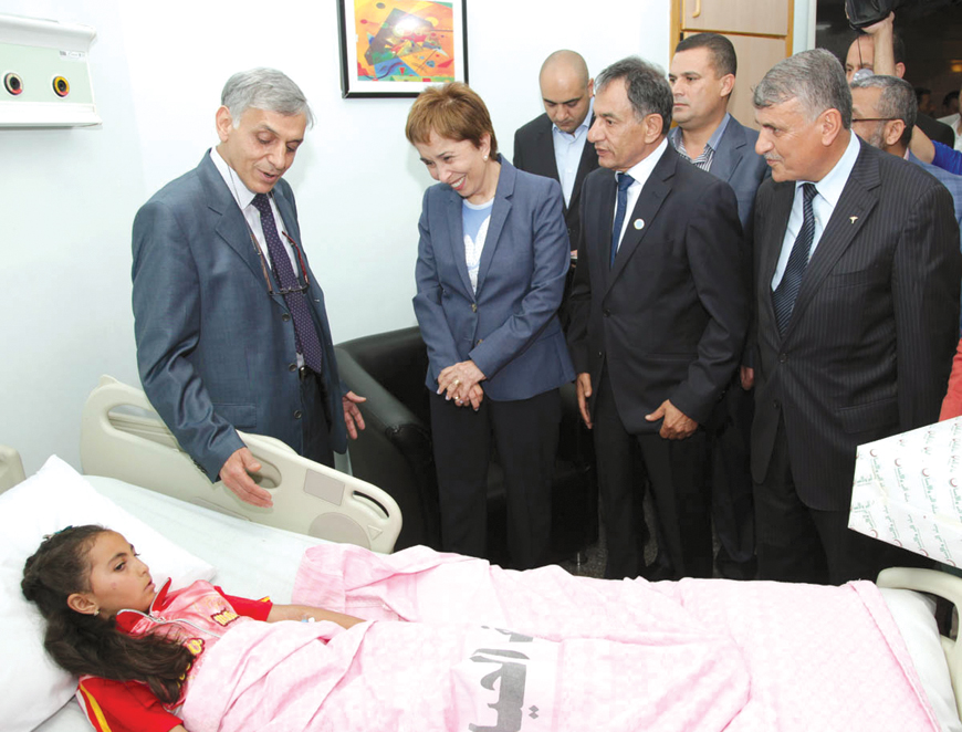 HRH Princess Basma visits 10-year-old Rania Kloub at Hayat General Hospital on Sunday (Petra photo)