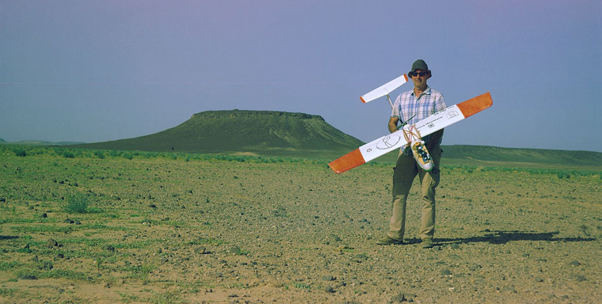 Researcher Yorke Rowan with a drone in Eastern Badia during one of field seasons (Photo courtesy of Austin Chad Hill)