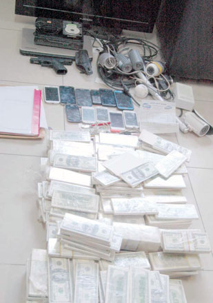 Items seized by security forces in dawn raids in Ramtha, 90km north of Amman, on Tuesday (Petra photo)