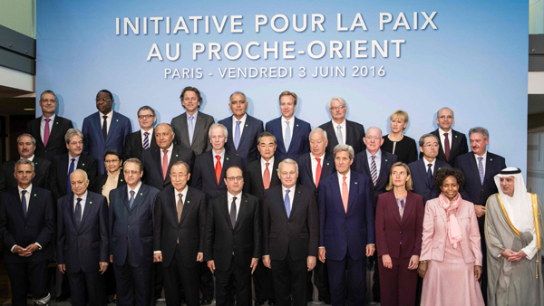 A group photo of the officials who participated in the Paris meeting to revive Palestinian-Israeli peace talks on Friday (AFP photo)