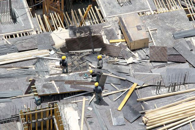 Workers at a major construction site in Amman are seen in this recent photo (JT file photo)