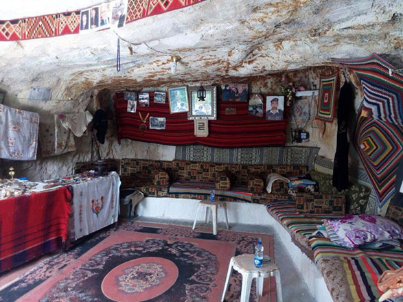 Shobak resident Mohammed Malaheem, who seeks to provide an authentic Jordanian experience to tourists, has turned a cave into a hotel and a car into a bedroom (Photo by Khaled Oudat)