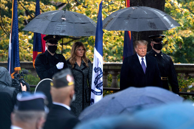 US First Lady Melania Trump and President Donal Trump arrive for a wreath laying ceremony at the Tomb of the Unknown Soldier for Veterans Day at Arlington National Cemetery in Arlington, Virginia, on Wednesday (AFP photo)