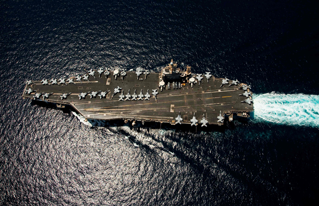 The Nimitz-class aircraft carrier USS Abraham Lincoln transits through the Arabian Sea on April 5, 2012. The US will bolster its military presence in the Middle East, deploying additional warships and fighter jets to protect US personnel and defend Israel amid soaring tensions in the region, the Pentagon said on August 2, 2024 (AFP photo)