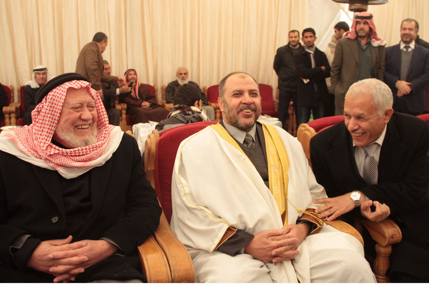 Zaki Bani Rsheid (centre), deputy overall leader of the Muslim Brotherhood group, speaks to Islamists on Monday during a gathering in Amman to celebrate his release from jail (Photo by Raad Adayleh)