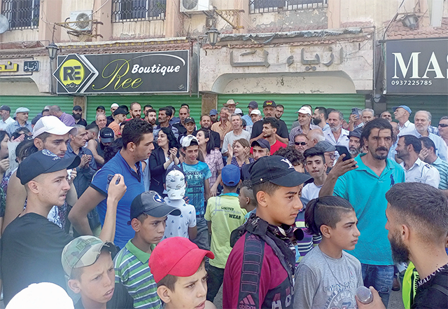 This handout photo released by the Suwayda 24 news site shows people protesting in the southern Syrian city of Sweida on Monday (AFP photo)