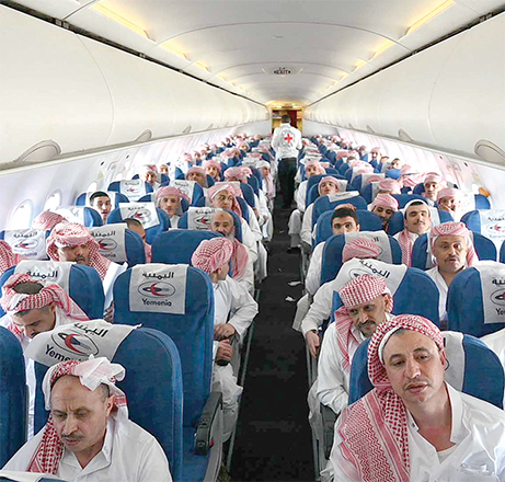 A handout photo released by the International Committee of the Red Cross on Saturday shows Freed Houthi prisoners awaiting take off on board a plane from the Saudi city of Abha to Yemen's capital Sanaa (AFP photo)