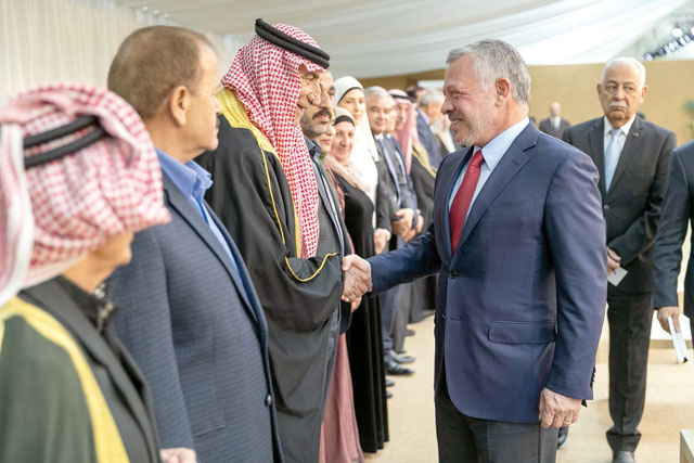 His Majesty King Abdullah meets with representatives and leading figures from the Bani Hassan tribe at the Royal Hashemite Court on Sunday (Photo courtesy of Royal Court)