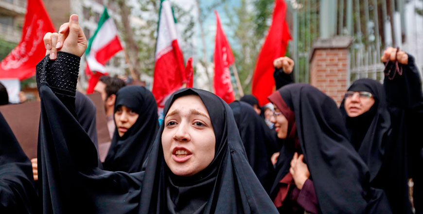 Iranian women chant slogans during an anti-US demonstration outside the former US embassy headquarters in the capital Tehran on Wednesday (AFP photo)