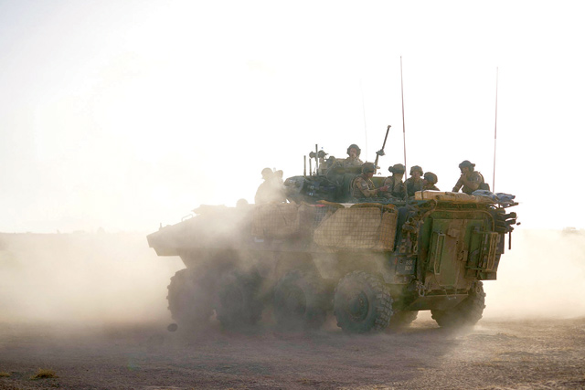 In this file photograph taken on November 11, 2019, an Armoured Personnel Carrier of the French Army patrols a rural area during the Bourgou IV operation in northern Burkina Faso along the border with Mali and Niger (AFP photo)