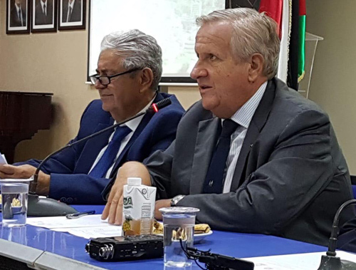 Italian Ambassador Giovanni Brauzzi (right) and architect Kamel Mahadin discuss the project of connecting the Amman Citadel with the Roman Theatre on Monday (Photo courtesy of Italian embassy)