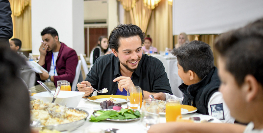 HRH Crown Prince Hussein joins orphans for an Iftar meal in Amman on Wednesday  (Photo courtesy of Royal Court)