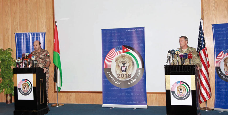 Brig. Gen. Mohammad Thalji (left) and US Maj. Gen. Jon Mott hold a joint press conference to launch the Eager Lion military drill for 2018 in Amman on Sunday (Petra photo)