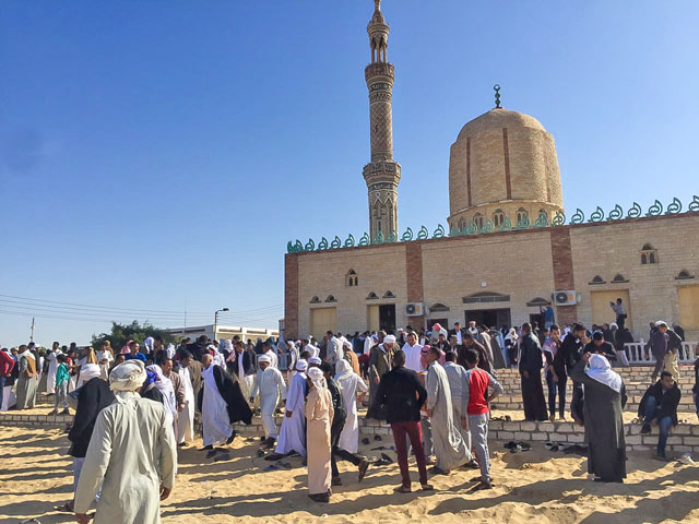 People attend the Friday prayers at Al Rawda Mosque at Bir Al Abd town near Al Arish, 400km northeast of Cairo, Egypt, on Friday (Anadolu Agency photo)