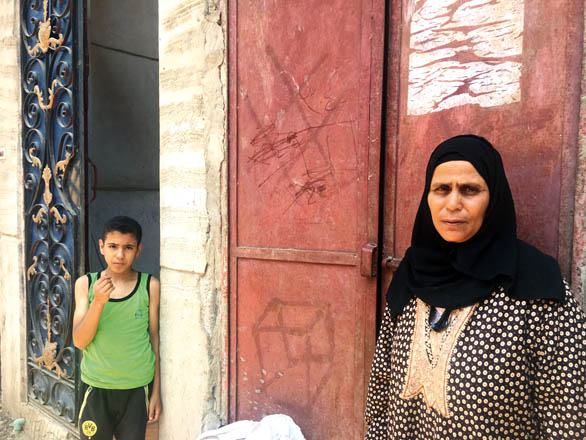 Adia Al Sharkawi, the mother of Abdel Rahman Shaban Abokorah, a 28-year-old plumber who killed two German women and wounded four other tourists last Friday at the Zahabia Hotel and neighbouring Sunny Days Palacio Resort at Hurghada, is seen in Kafr Al Sheikh, Egypt, on Tuesday (Reuters photo)