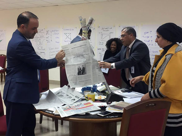 Employees from the Independent Election Commission (IEC) perform an activity during a training on electoral management at the IEC headquarters in Amman on Wednesday (Photo by Camille Dupire) t