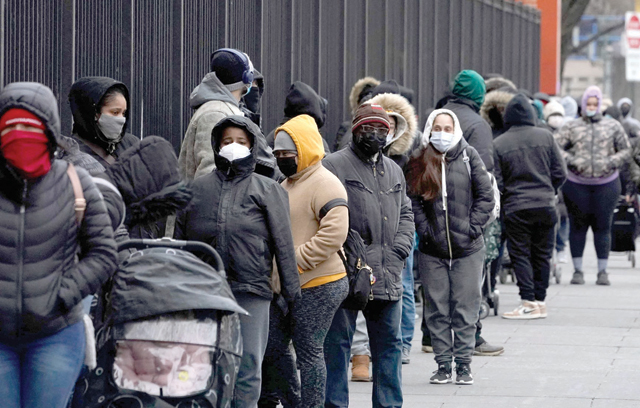 People line up for COVID testing at Lincoln Medical Centre in the Bronx in New York on Monday (AFP photo)