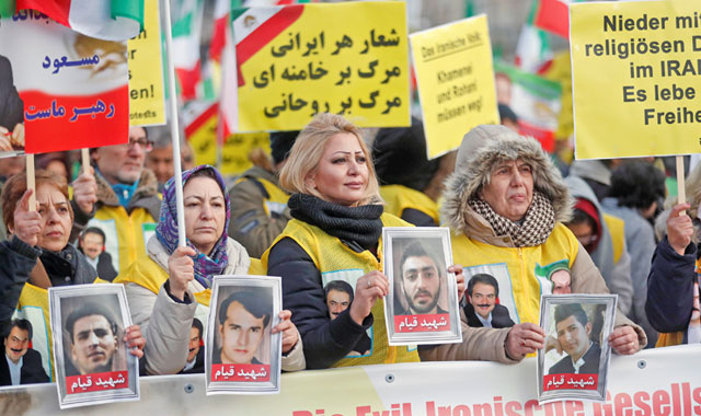 People demonstrate in front of the Brandenburg Gate to support protests across Iran in Berlin, Germany, on Saturday (Reuters photo)2
