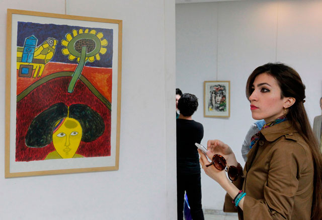 Iraqis attend an exhibition, titled Picasso in Baghdad, on Monday, in the Iraqi capital (AFP photo)