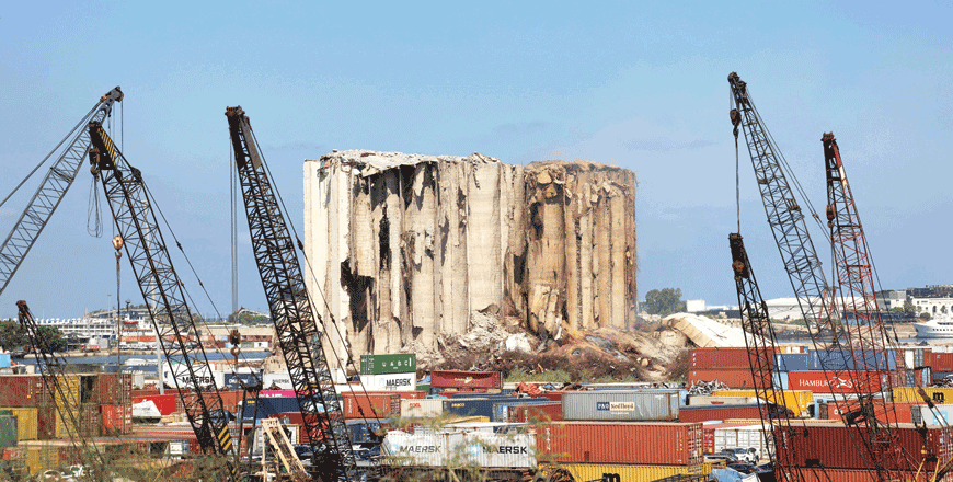 This file photo taken on August 12, 2022, shows a part of the middle grain silos in the port of Beirut which collapsed the week following the damage caused by the August 4, 2020 massive explosion that hit the Lebanese harbour (AFP photo)