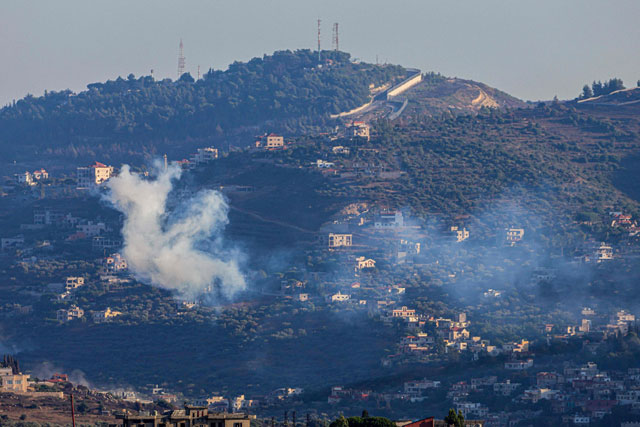 Smoke billows following an Israeli strike near the village of Kfar Kila in southern Lebanon on Tuesday, amid continuing tensions on the Lebanese-Israeli border (AFP photo)