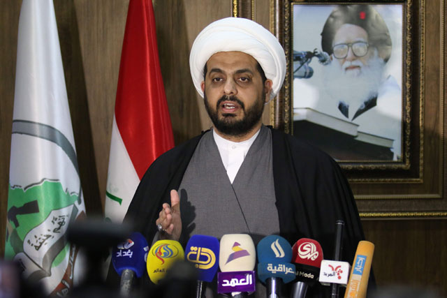 This file photo taken on January 8, 2016, shows Sheikh Qais Al Khazali, the Iraqi secretary general of the Shiite group Asaib Ahl Al Haq (The League of the Righteous), speaking during a press conference in the Iraqi mainly Shiite southern city of Basra (AFP photo)