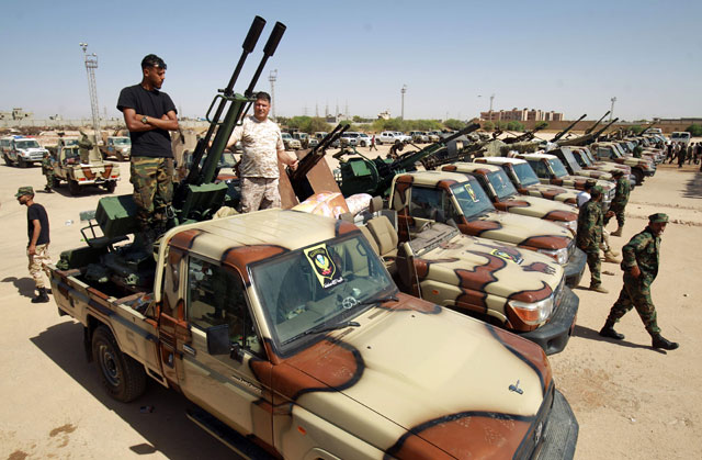 This file photo taken on June 18, shows members of the self-proclaimed eastern Libyan National Army (LNA) special forces gather in the city of Benghazi, on their way to reportedly back up fellow LNA fighters on the frontline west of the city of Sirte, facing forces loyal to the UN-recognised Government of National Accord (AFP photo)