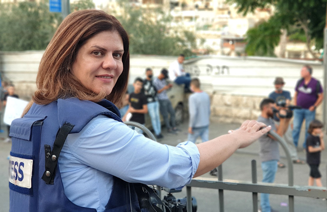 This handout file photo obtained from a former colleague of Al Jazeera's slain veteran TV journalist Shireen Abu Akleh, shows her reporting from Jerusalem on June 12, 2021 (AFP photo)