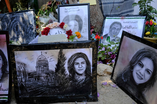 Portraits of the late Palestinian Al Jazeera journalist Shireen Abu Akleh are seen at an art exhibit honouring her in Jenin city in the occupied West Bank, on May 19 (AFP photo)