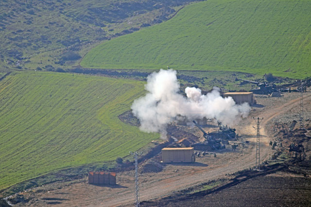 This photo taken in Turkey's Hatay province, on Wednesday, shows Turkish Armed Forces' howitzers as they continue to hit Kurdish targets within the 'Operation Olive Branch' launched in Syria's Afrin (Anadolu Agency photo)