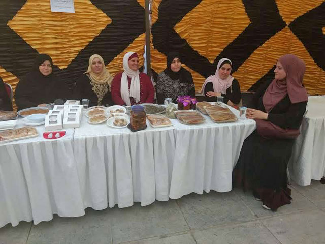 Noor (fourth from the left) is surrounded by her peers from the self-help group during a bazaar in Irbid in September (Photo courtesy of LWF Jordan)