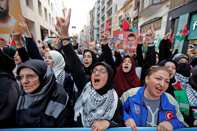 Pro-Palestinian demonstrators march to mark the 8th anniversary of the Mavi Marmara Gaza flotilla incident and to protest against Israel, in central Istanbul, Turkey, on Thursday (Reuters photo)