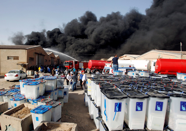 Smoke rises from a storage site in Baghdad, housing ballot boxes from Iraq’s May parliamentary election, Iraq, on Sunday (Reuters photo)