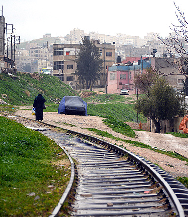 Scattered showers fall in Amman, on Saturday. The Jordan Meteorological Department forecast more showers and cold weather for Sunday and Monday  (Photo by Amjad Ghsoun)