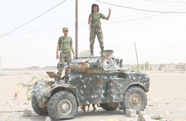 Fighters with the UAE-trained Security Belt forces loyal to the pro-independence Southern Transitional Council stand atop a military vehicle near the south-central coastal city of Zinjibar in south-central Yemen, in the Abyan Governorate, on Wednesday (AFP photo)