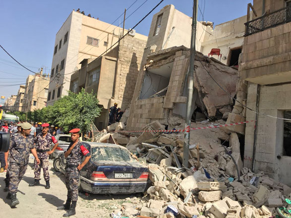 This photo shows the collapsed building in the Hawooz neighbourhood in Zarqa on Wednesday (Petra photo)