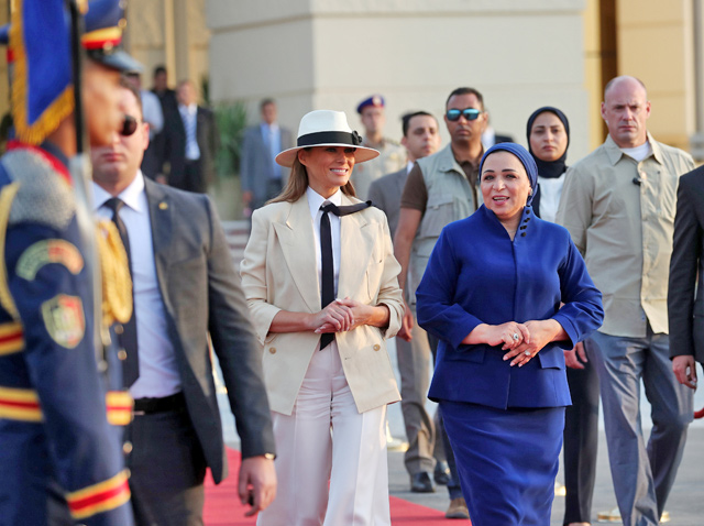 US First Lady Melania Trump walks with Egyptian First Lady Entissar Amer as she prepares to depart Cairo, Egypt, on Saturday (Reuters photo)