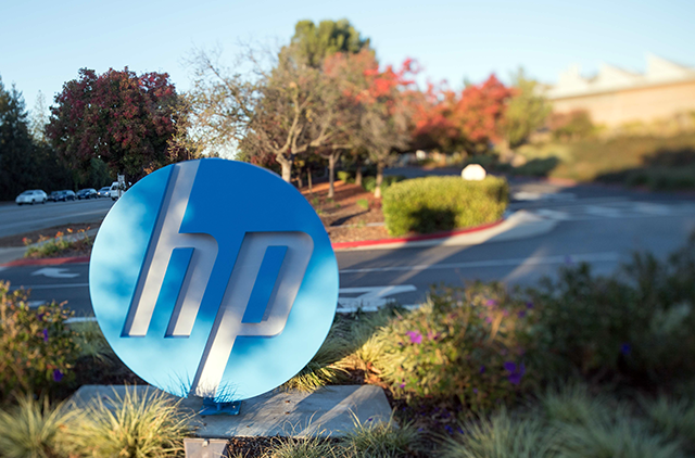 HP logo is seen on a sign at Hewlett Packard's headquarters in Palo Alto, California on November 4, 2016 (AFP photo)