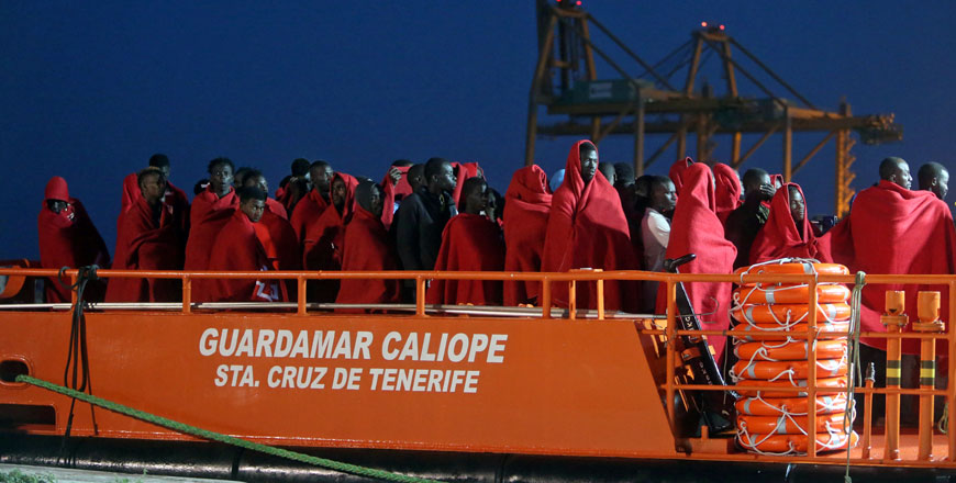 Migrants, intercepted off the coast in the Mediterranean Sea, arrive on a rescue boat at the port of Malaga, southern Spain, on Wednesday (Reuters photo)