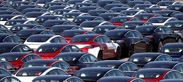 Newly manufactured Tesla electric cars are pictured in a storage area at The Western Docks in Southampton, on April 20 (AFP photo)