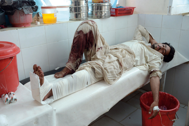 An Afghan victim receives treatment at a hospital following a suicide attack in Mohmand Dara district of Nangarhar Province on Tuesday (AFP photo)
