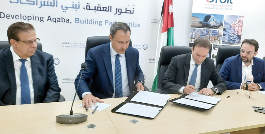 Officials during the signing of an agreement to establish an aluminum rolling mill in the Aqaba Special Economic Zone Authority on Tuesday (Petra photo)
