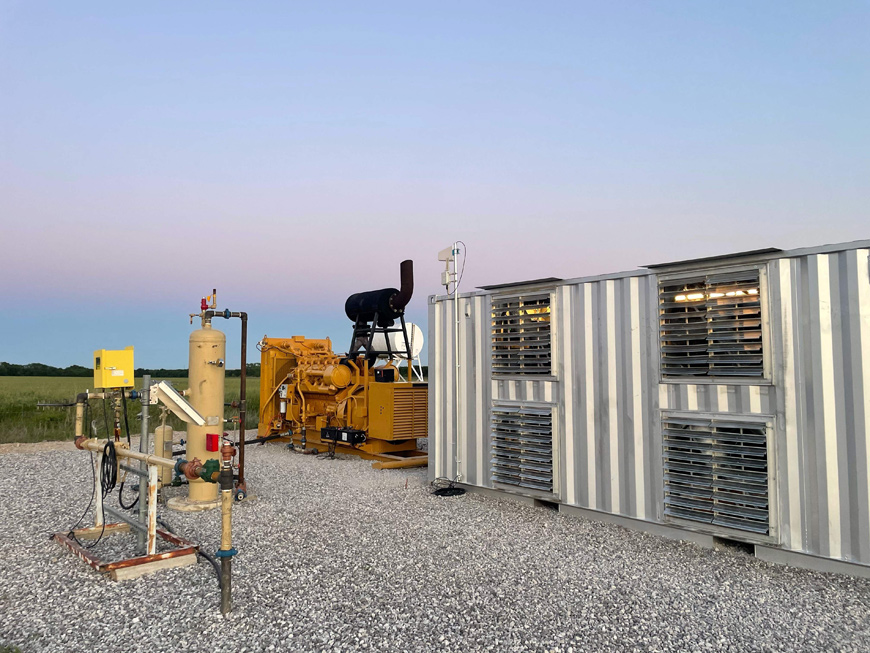 This photo taken on May 6, shows a natural gas generator powering a Bitcoin mining data center on an oil field in North Texas  (AFP photo)