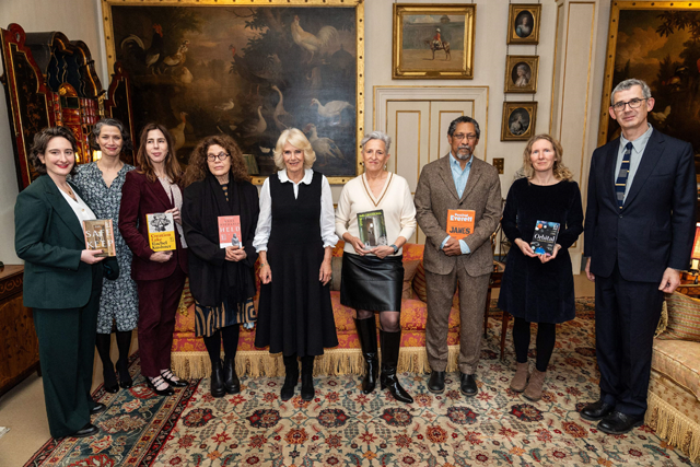 Booker Prize 2024 shortlisted authors with  Samantha Harvey( second from the right) pose with Britain’s Queen Camilla (centre) during a reception for the Booker Prize Foundation at Clarence House, in London, on Tuesday (AFP photo)