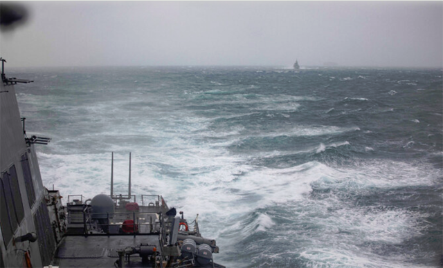 This handout photo taken on October 20, 2024 shows the guided-missile destroyer USS Higgins, foreground, and Royal Canadian Navy Halifax-class frigate HMCS Vancouver, in background, sailing in the Taiwan Strait (AFP photo)