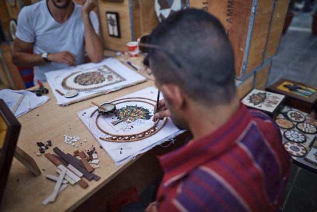 A craftsman working at Amman Design Week (Photo courtesy of Amman Design Week)