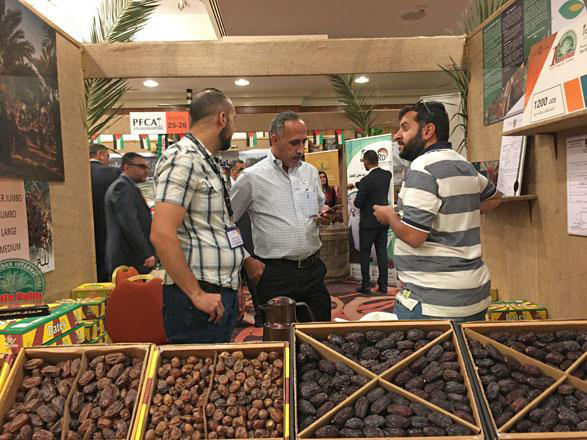 A producer showcases his dates at the first international date festival in October 2018 (JT file photo)