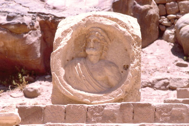 A relief in Petra representing Zeus or Dionysus, but also identifiable as Dushara, the supreme god of the Nabataeans  (Photo courtesy of ACOR)