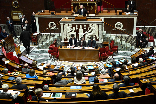 France's Prime Minister Francois Bayrou (centre) delivers a speech during a debateat the national assemblyin Paris on Wednesday (AFP photo)